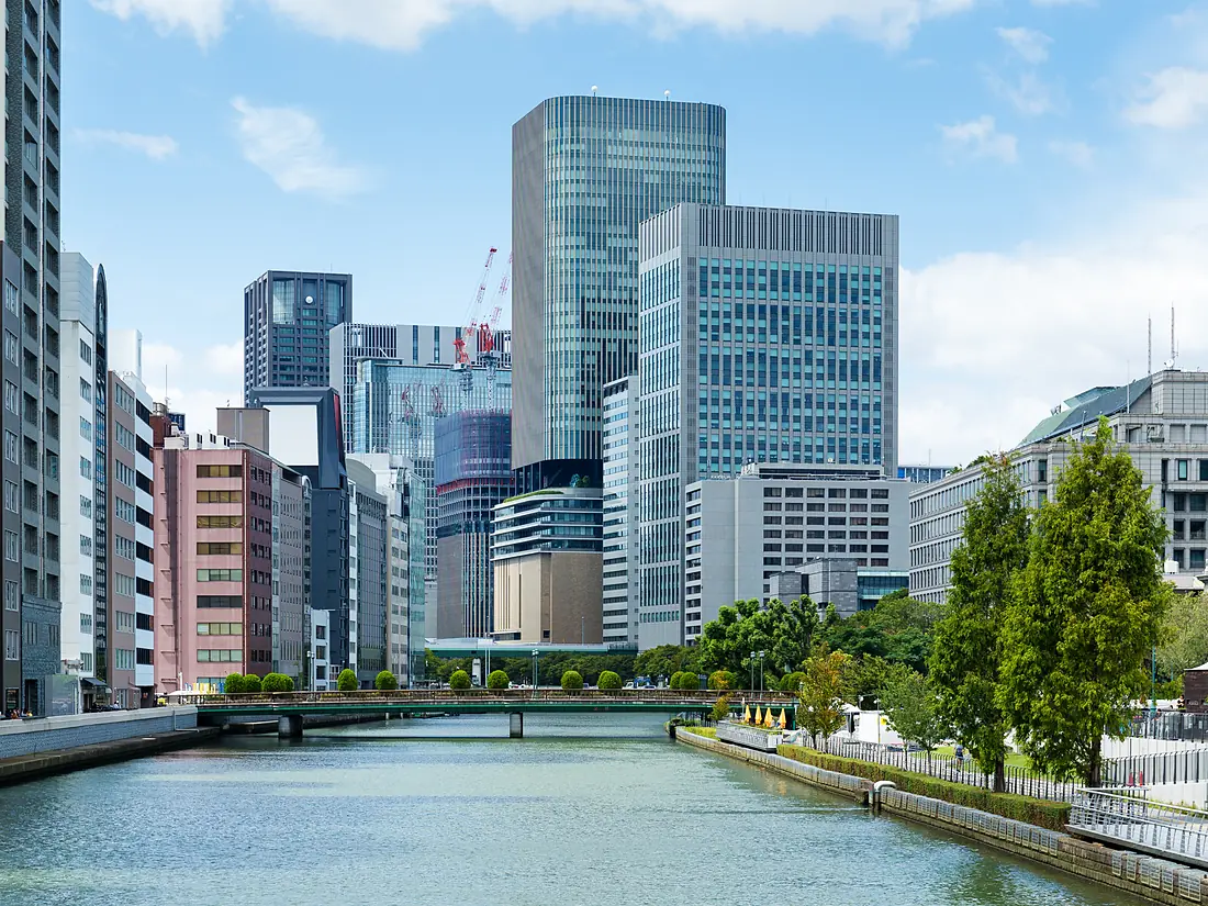 Office towers beside a canal in a Japanese city